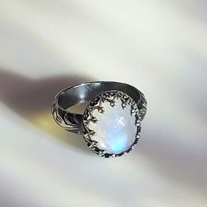 Rainbow moonstone ring with intricate band